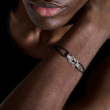 Model Wearing John Hardy Mens Silver Manah Knot Extra Thin Width Orange Cord Bracelet