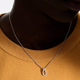 Model Wearing John Hardy Mens Diamond Surf Link Small Pendant Necklace in Sterling Silver