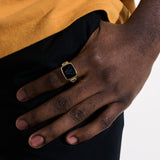 Model Wearing John Hardy Mens 14k Gold Signet Ring with Carved Black Onyx Stone