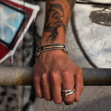 Model Wearing Petrichor ENCASED VIKING SWORD Celtic Warrior Bracelet by Keith Jack and Viking Sword Ring