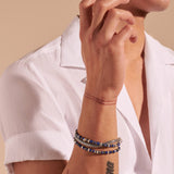Model Wearing John Hardy Mens Transformable Multi-Wrap Blue Bead and Silver Hybrid Bracelet and Necklace - Triple Wrap Bracelet