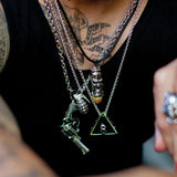 Model 1 Wearing Ecks TIKI WARRIOR BULLET Sterling Silver Mens Necklace with 14k Gold